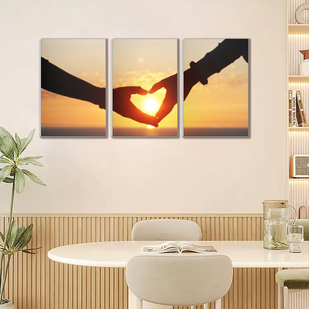 Couple Making Heart Gesture At Sunset,Triple Frameless Canvas Painting.